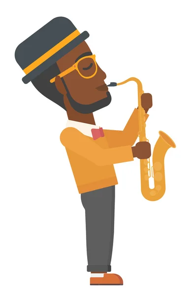 Muž hrající na saxofon. — Stockový vektor