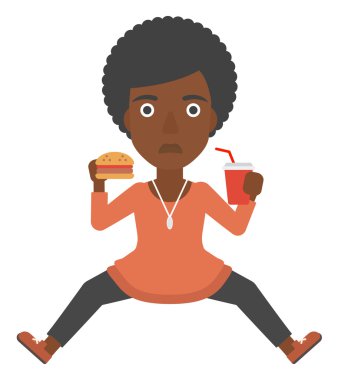 Hamburger yiyen kadın.