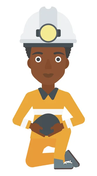 Miner holding coal in hands. — Stock Vector