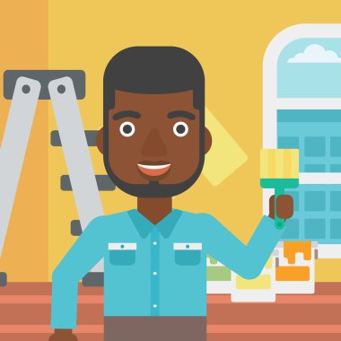 Boya fırçası ile ressam.