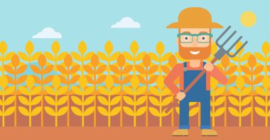 Çiftçi dirgen ile.