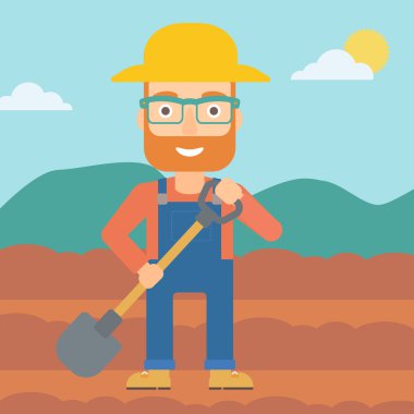 Kürek ile sahada çiftçi.