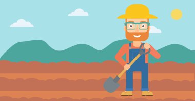 Kürek ile sahada çiftçi.