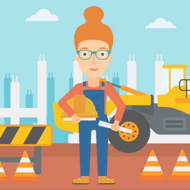 Kask ile mühendis ve blueprint.