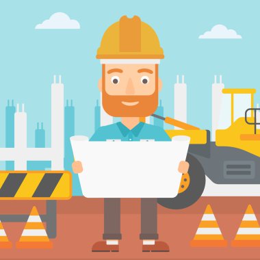 Bir plan tutan mühendisi.