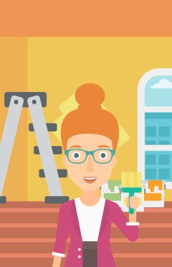 Boya fırçası ile ressam.