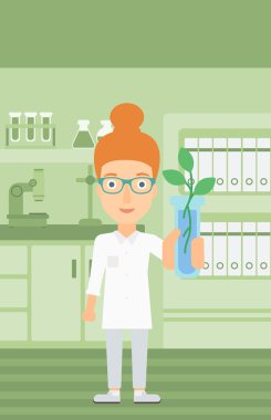 Test tüplü laboratuar asistanı.
