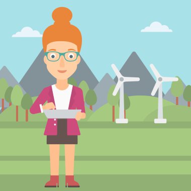 Tablet bilgisayar kullanan kadın.