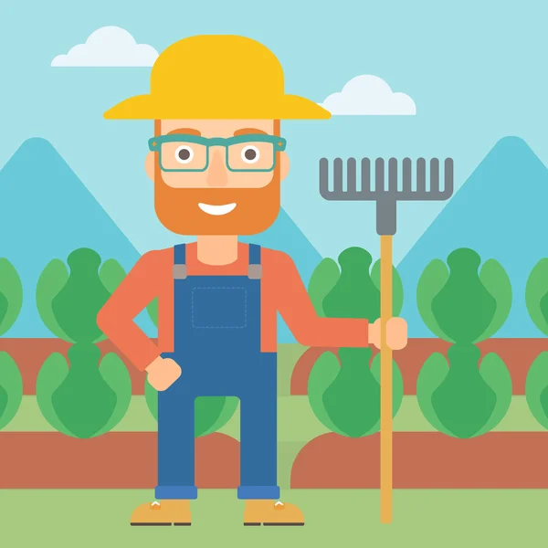 Farmer with rake. — Stock Vector