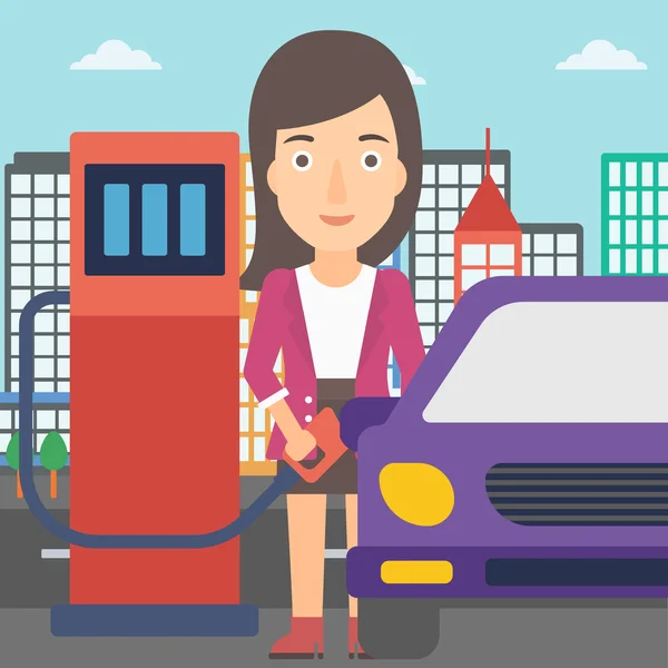 Женщина заправляет топливо в машину . — стоковый вектор