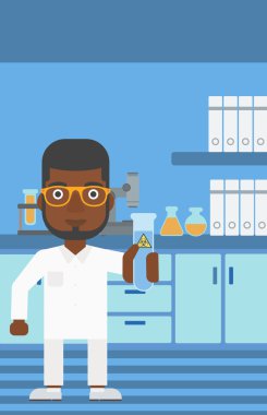 Test tüplü laboratuar asistanı.