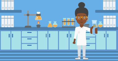 Test tüplü laboratuar asistanı.