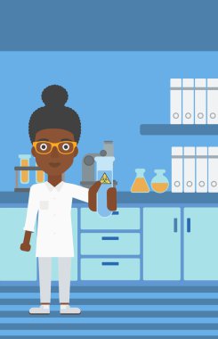 Test tüplü laboratuar asistanı.