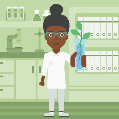 Test tüplü laboratuar asistanı.