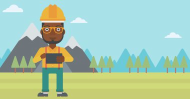 tablet bilgisayar tutan adam.