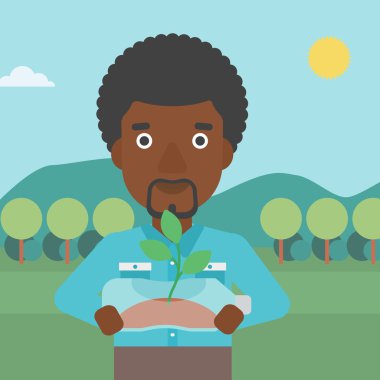 Şişede büyüyen bitki olan adam.