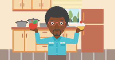 Man with apple and cake.