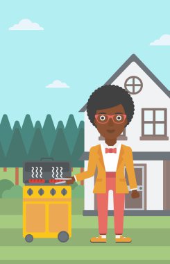 Kadın hazırlanıyor Barbekü.