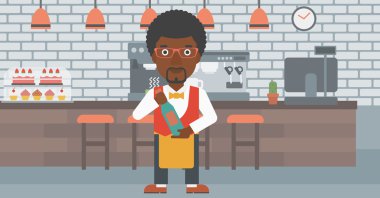 Garson holding şişe şarap.