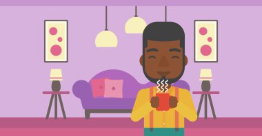 Elinde kahve tutan adam..