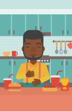 Mide ekşimesi muzdarip adam.