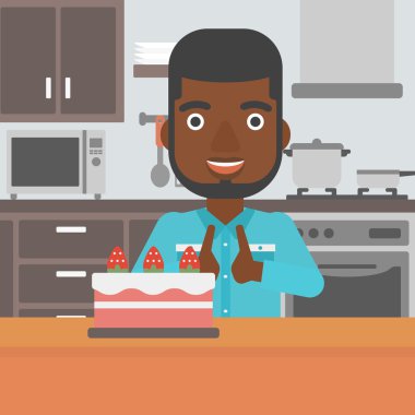 Man looking at cake.