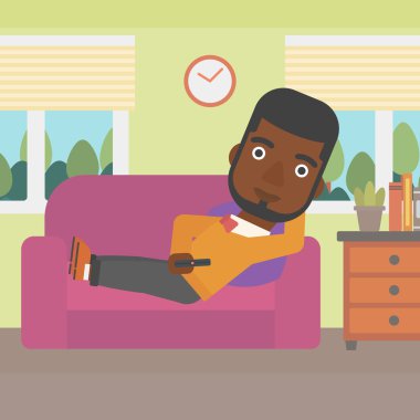 Adam kanepede yatıyor..