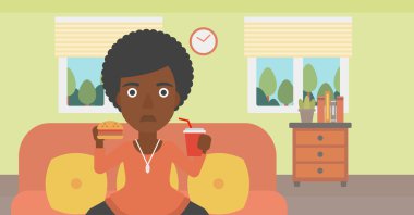 Hamburger yiyen kadın.