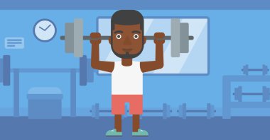 Adam halteri kaldırıyor..