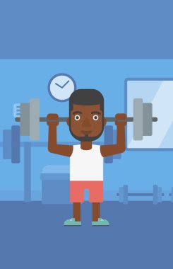 Adam halteri kaldırıyor..