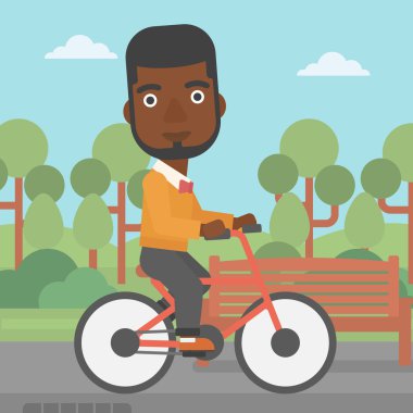 Bisiklete binen adam.