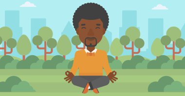 Lotus pozisyonunda meditasyon yapan iş adamı..