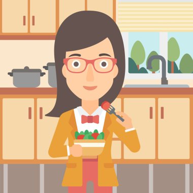 Salata yiyen kadın.