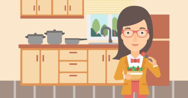 Salata yiyen kadın.