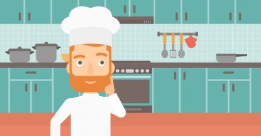 Chef pointing forefinger up.