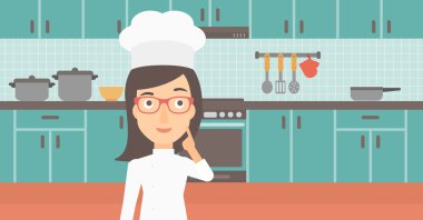 Chef pointing forefinger up.