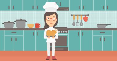 Woman holding roasted chicken.