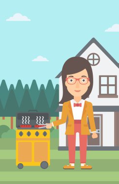 Kadın hazırlanıyor Barbekü.