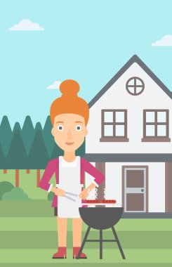 Kadın hazırlanıyor Barbekü.