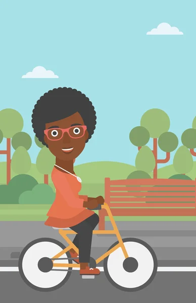 Mujer montando bicicleta. — Vector de stock