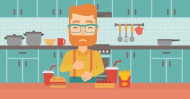 Mide ekşimesi muzdarip adam.