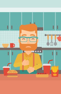 Mide ekşimesi muzdarip adam.