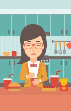 Mide ekşimesi muzdarip kadın.