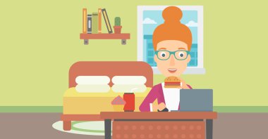 Hamburger yiyen kadın.