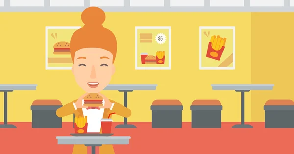 Femme manger hamburger . — Image vectorielle