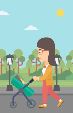 kadın iterek çocuk arabası.