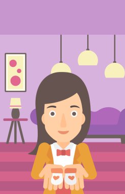 hamile kadınla Bebek Patiği.