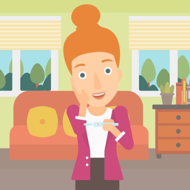 Hamilelik testi olan kadın.