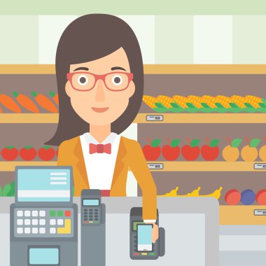 Customer paying with smartphone using terminal.