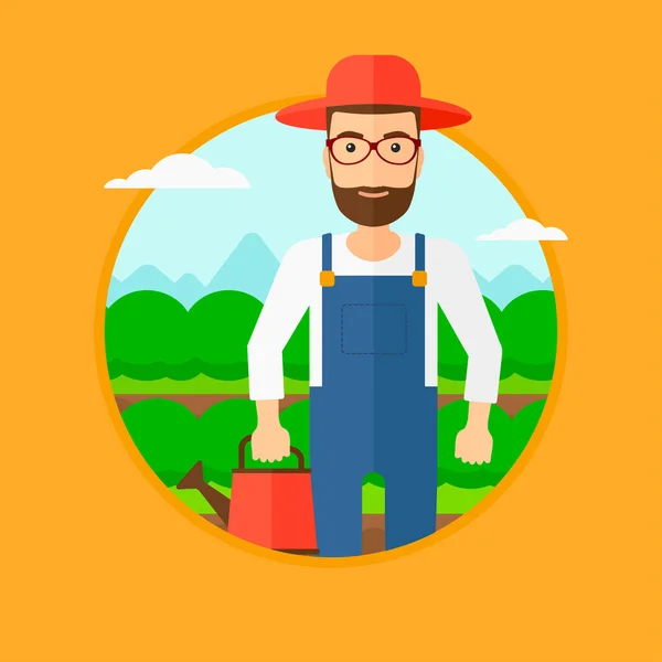 Agricultor con regadera en el campo de repollo . — Vector de stock